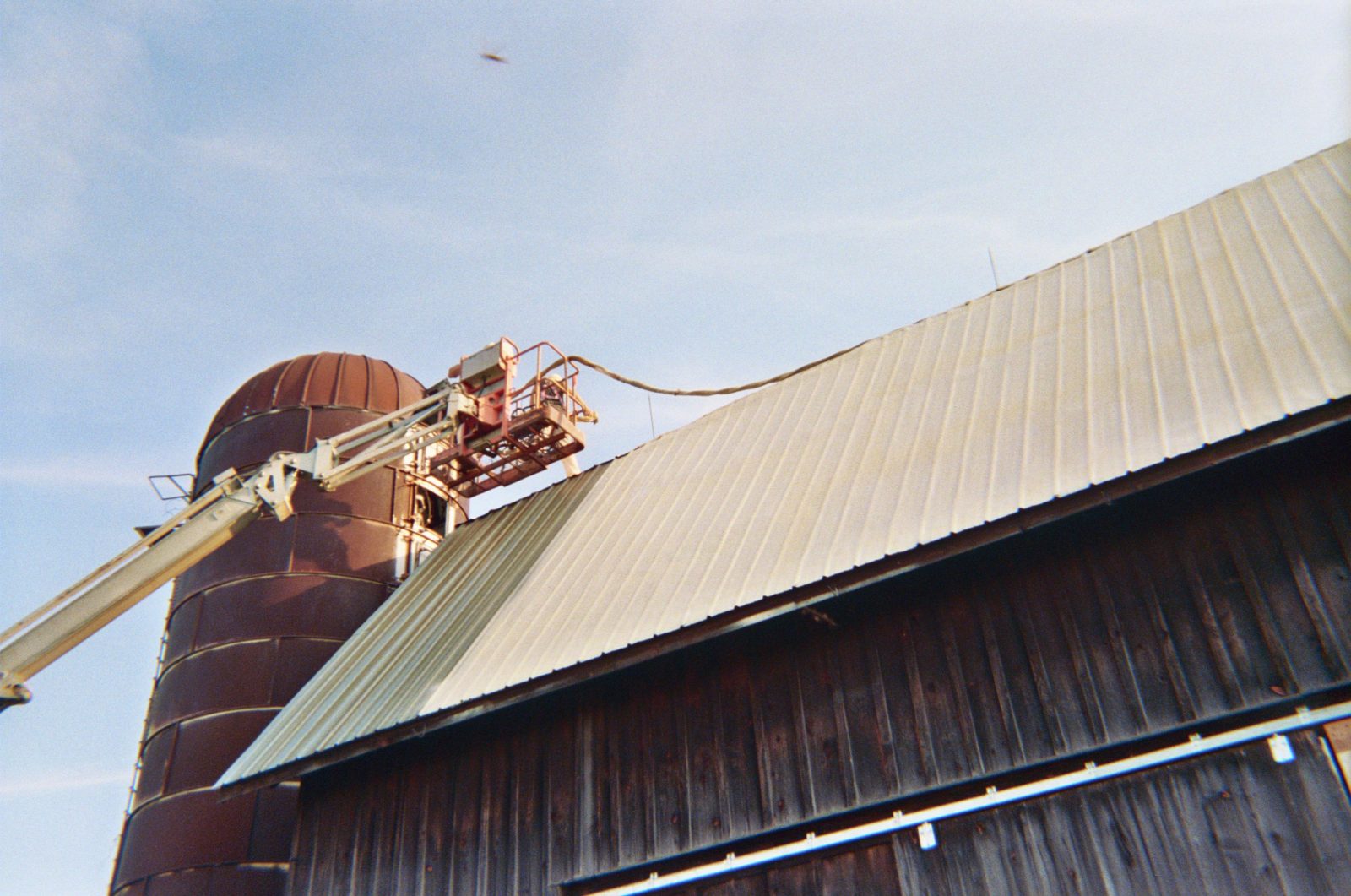 Foam roof system on agricultural barn